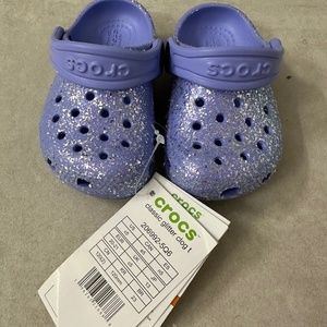 Infant Size 5 Crocs purple glitter NWT